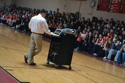 ORR Pep Rally
Principal Michael Devoll gave Old Rochester Regional High School students a “shot in the arm” of school spirit on Friday January 31 – rather overdue for a school with a varsity basketball team currently in first place, a number of losing streaks in sports that have finally come to an end, and an undefeated debate team, among other reasons for students to be proud. Photo by Jean Perry
