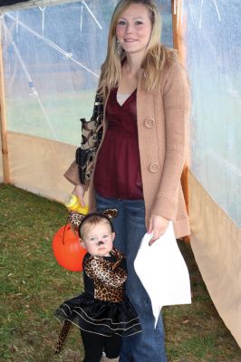 Plumb Corner Halloween
Rain didn't stop a few brave trick or treaters from coming to the October 24 Plumb Corner Halloween celebration. Businesses at Plumb Corner provided candy and shelter from the rain. A tent in the Plumb Corner field held a ghoulishly good time, with a devilish D.J. and Halloween-themed music. Photo by Anne O'Brien-Kakley.
