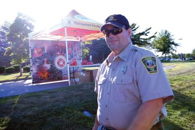 National Night Out
The Tri-Town’s inaugural edition of National Night Out drew a big and enthusiastic crowd on Tuesday. Residents watched the Plymouth County Sheriff’s Department’s Ken Ballinger demonstrate K-9 tactics, got a feel for SWAT, EMS, and Fire vehicles; and enjoyed pizza and ice cream. The event is a celebration of crime prevention and community policing. Photos by Shawn Badgley.
