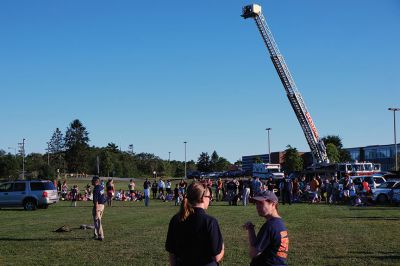 National Night Out
The Tri-Town’s inaugural edition of National Night Out drew a big and enthusiastic crowd on Tuesday. Residents watched the Plymouth County Sheriff’s Department’s Ken Ballinger demonstrate K-9 tactics, got a feel for SWAT, EMS, and Fire vehicles; and enjoyed pizza and ice cream. The event is a celebration of crime prevention and community policing. Photos by Shawn Badgley.
