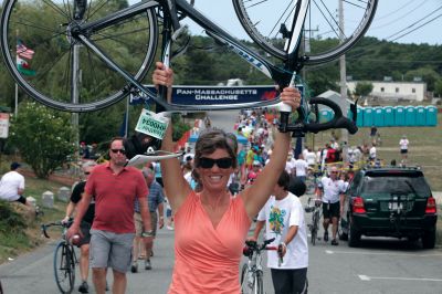 PanMass Challenge
Mattapoisett resident Heather Briggs Hobler celebrates a victorious ride at the August 7 and 8 2010 Dana-Farber Pan-Mass Challenge. Ms. Hobler was one of 20 Tri-Town residents who rode to raise money for cancer research. Photo courtesy of Peter McGowan.
