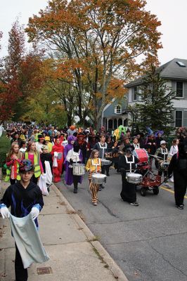 Halloween Parade
The streets of Marion were flooded with Halloween Parade participants and attendees, as members of the Sippican Elementary School Band helped the “witches” of the Marion Art Center lead a procession that began at the Music Hall and went down Front Street, up Main Street past the Elizabeth Taber statue and onto Spring Street, where children were met at Town House by staff members handing out candy for the kids. Photos by Mick Colageo
