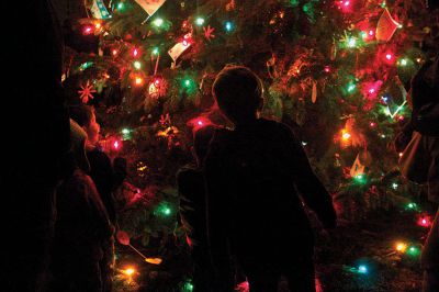 Holiday In The Park
Local children check out Mattapoisett's Christmas tree up close after the lighting ceremony at Holiday In The Park on Saturday, December 8.  Photo by Eric Tripoli.
