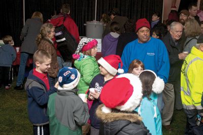 Holiday In The Park
 The white tent on Shipyard Park was packed with excited holiday celebrants of all ages at Mattapoisett's annual Holiday In The Park event.  Photo by Eric Tripoli.
