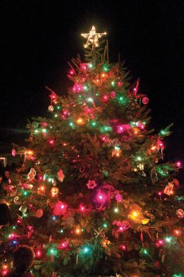 Holiday In The Park
Holiday In The Park culimated with the lighting of the town tree, which is bedecked in handmade ornaments by residents and students of Mattapoisett.  Photo by Eric Tripoli.
