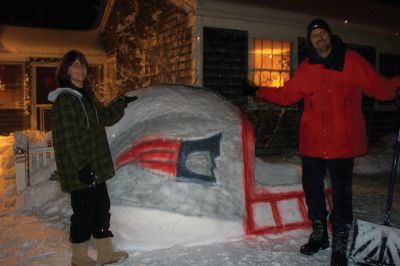 Go Pats!
Joann Price, Jim Price, Steven Price, Jennifer O’Neil, Tommy Morss and Janine Price are all responsible for the creation of the Patriot helmet in front of the Price residence on Acushnet Road in Mattapoisett. It took a lot of planning and building while watching the snow fall on Saturday and Buddy the Black Lab even helped out! They had a great time building it and hope it brings the Patriots a lot of luck! Photos courtesy of Janine Price
