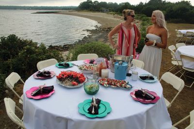 Great Picnic
Attendees at Friday night’s “Great Picnic” on the one-acre Munro preserve overlooking Mattapoisett Harbor enjoyed live music and adorned their tables with creatively competitive centerpieces featuring everything from a palm tree to pickleballs. Mattapoisett Land Trust Vice President Peter Davies told the Wanderer that the Mattapoisett Museum and the MLT have jointly organized the event for five nonconsecutive years. Proceeds from the annual event support their programs. Photos by Mick Colageo
