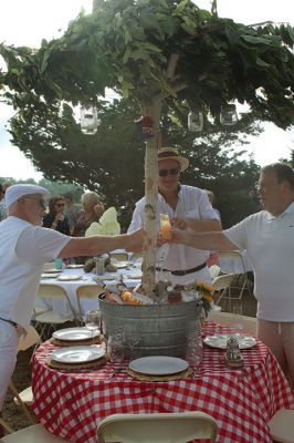 Great Picnic
Attendees at Friday night’s “Great Picnic” on the one-acre Munro preserve overlooking Mattapoisett Harbor enjoyed live music and adorned their tables with creatively competitive centerpieces featuring everything from a palm tree to pickleballs. Mattapoisett Land Trust Vice President Peter Davies told the Wanderer that the Mattapoisett Museum and the MLT have jointly organized the event for five nonconsecutive years. Proceeds from the annual event support their programs. Photos by Mick Colageo
