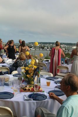 Great Picnic
Attendees at Friday night’s “Great Picnic” on the one-acre Munro preserve overlooking Mattapoisett Harbor enjoyed live music and adorned their tables with creatively competitive centerpieces featuring everything from a palm tree to pickleballs. Mattapoisett Land Trust Vice President Peter Davies told the Wanderer that the Mattapoisett Museum and the MLT have jointly organized the event for five nonconsecutive years. Proceeds from the annual event support their programs. Photos by Mick Colageo
