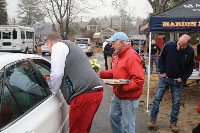 Pie & Poinsettia
In lieu of the annual senior luncheon, the Town of Marion collaborated with the Marion Fire Fighters Association, the Marion Police Brotherhood and Tabor Academy to hold a Pie & Poinsettia pickup on December 11 at the Cushing Community Center. Photos by Mick Colageo
