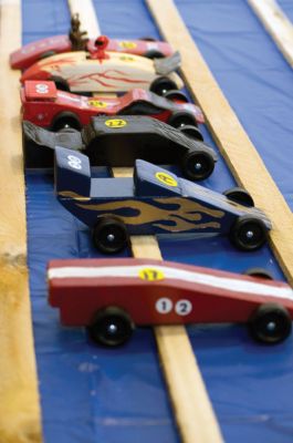 Derby Days
On Saturday, January 30, 2010 Marion's Scouts Pack 32 held the first Pine Wood Derby in three years. The Derby was held at the Sippican School where scouts raced cars weighing less than 5 ounces down a sloped wooden track. Everyone cheered as the wooden cars raced down the track in packs or four. Photo by Felix Perez.
