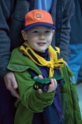 Derby Days
On Saturday, January 30, 2010 Marion's Scouts Pack 32 held the first Pine Wood Derby in three years. The Derby was held at the Sippican School where scouts raced cars weighing less than 5 ounces down a sloped wooden track. Everyone cheered as the wooden cars raced down the track in packs or four. Photo by Felix Perez.
