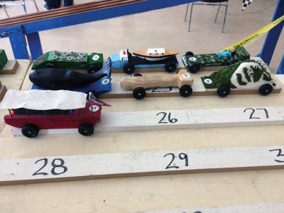 Pinewood Derby
Mattapoisett Pack 53 held its Pinewood Derby on March 9 at the Mattapoisett Congregational Church. The Cub Scout division had 14 entries, and the Enthusiasts division had 11 entries. The five fastest Cub Scouts cars going to the regional competition in Rochester on March 23: 1st Gabe Michaud, 2nd Kyle Pina, 3rd Thomas Tseki, 4th Matthew Crain, and 5th Eamon Perez. Matthew Crain's blue and gold lego car won Best Scout Theme car, and the Most Unique Design went to Liam Garvin's camping car.  
