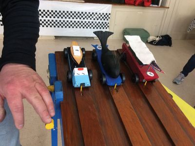 Pinewood Derby
Mattapoisett Pack 53 held its Pinewood Derby on March 9 at the Mattapoisett Congregational Church. The Cub Scout division had 14 entries, and the Enthusiasts division had 11 entries. The five fastest Cub Scouts cars going to the regional competition in Rochester on March 23: 1st Gabe Michaud, 2nd Kyle Pina, 3rd Thomas Tseki, 4th Matthew Crain, and 5th Eamon Perez. Matthew Crain's blue and gold lego car won Best Scout Theme car, and the Most Unique Design went to Liam Garvin's camping car.  
