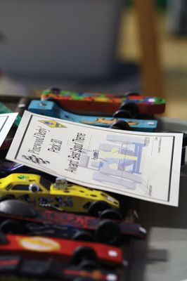 Pinewood Derby
Cub Scouts Pack 30 held its annual Pinewood Derby on Saturday, January 13 at Rochester Memorial School. The pinewood derby is a tradition that was started back in 1963 in Manhattan Beach, California and persists to this day. In addition to placing as the fastest cars, the scouts’ cars are also awarded for design and creativity. Photos by Jean Perry
