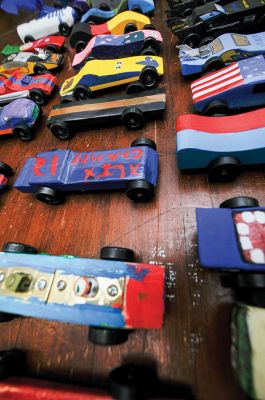 Pinewood Derby Time
Marion Cub Scout Troop #32 had its annual Pinewood Derby on February 8 at the Marion Congregational Church. Scouts assembled and designed their wooden racecars hoping to come in first place or win a prize for most original car or coolest car. Photos by Felix Perez
