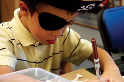 Talk Like A Pirate Day
Erick Dawson works hard on constructing his treasure chest on September 19 as he takes part in Plumb Library’s celebration of International Talk Like A Pirate Day.  Photo by Eric Tripoli.
