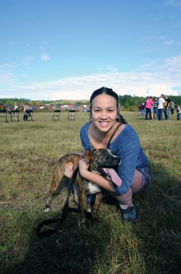 Rochester Dog Show
Alexis Rose with her dog Munroe at a dog show held Saturday in Rochester focusing mainly on pit bulls, an opportunity to dispel prejudices against the breed and highlight some of their qualities. Photo by Felix Perez. September 26, 2013 edition
