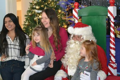 Pizza with Santa
It’s never Christmas in Marion until you’ve sat on Santa’s lap followed by a slice of pizza. Sunday was the annual Pizza with Santa, hosted by the Marion Police Brotherhood. Guests brought donated toys for families in need and enjoyed a hot slice of pizza with the man of the hour. Photos by Jean Perry 
