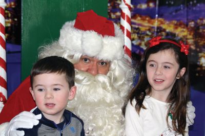 Pizza with Santa
It’s never Christmas in Marion until you’ve sat on Santa’s lap followed by a slice of pizza. Sunday was the annual Pizza with Santa, hosted by the Marion Police Brotherhood. Guests brought donated toys for families in need and enjoyed a hot slice of pizza with the man of the hour. Photos by Jean Perry 
