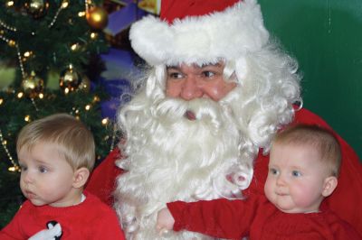 Pizza with Santa
It’s never Christmas in Marion until you’ve sat on Santa’s lap followed by a slice of pizza. Sunday was the annual Pizza with Santa, hosted by the Marion Police Brotherhood. Guests brought donated toys for families in need and enjoyed a hot slice of pizza with the man of the hour. Photos by Jean Perry 
