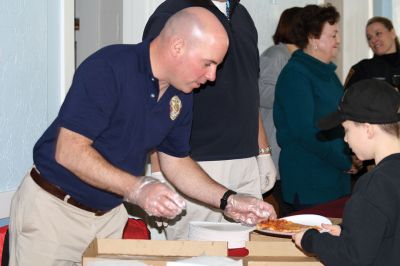 Pizza with Santa
It’s never Christmas in Marion until you’ve sat on Santa’s lap followed by a slice of pizza. Sunday was the annual Pizza with Santa, hosted by the Marion Police Brotherhood. Guests brought donated toys for families in need and enjoyed a hot slice of pizza with the man of the hour. Photos by Jean Perry 
