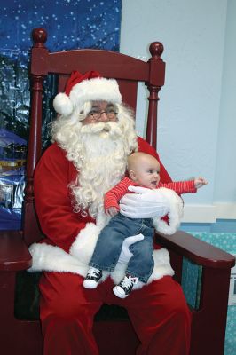 Santa and Mrs. Claus
Santa and Mrs. Claus made a stop at the Marion Police Brotherhood’s annual Pizza with Santa on Sunday, December 2, at the Benjamin D. Cushing Community Center. In addition to the jolly couple’s company, children and families enjoyed the pizza donated by Brewfish and even helped kick the Brotherhood’s Toy Drive into overdrive. Photos by Jean Perry
