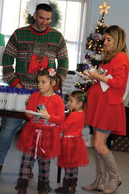 Pizza with Santa
The Marion Police Brotherhood held its annual Pizza with Santa at the Benjamin D. Cushing Community Center on Sunday, December 8. ‘Chief’ Santa and Mrs. Claus entertained the little ones before enjoying a pizza lunch. The Police Department’s “Fill a Cruiser” toy drive was in full gear as well, with several guests bringing toy donations to benefit children in foster care. Photos by Jean Perry
