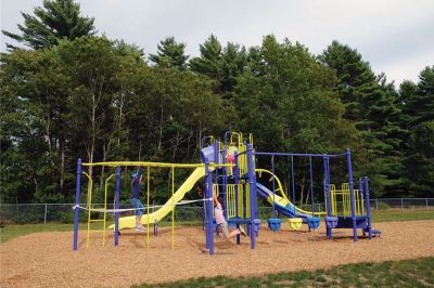 Rochester Memorial School Playground
Scores of Rochester Memorial School students, staff, and parents – as well as ORR School District Superintendent Doug White – gathered to celebrate the official opening of their new playground on Monday, constructed last month by volunteers. “It took a village to get this done,” said faculty member Craig Davignon during the festivities. “It’s proud day for our entire community.” New principal Derek Medeiros spoke, as well. Photo by Shawn Badgley 
