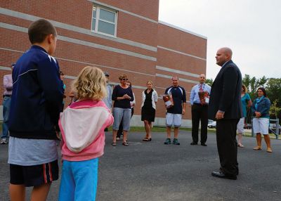 Rochester Memorial School Playground
Scores of Rochester Memorial School students, staff, and parents – as well as ORR School District Superintendent Doug White – gathered to celebrate the official opening of their new playground on Monday, constructed last month by volunteers. “It took a village to get this done,” said faculty member Craig Davignon during the festivities. “It’s proud day for our entire community.” New principal Derek Medeiros spoke, as well. Photo by Shawn Badgley 
