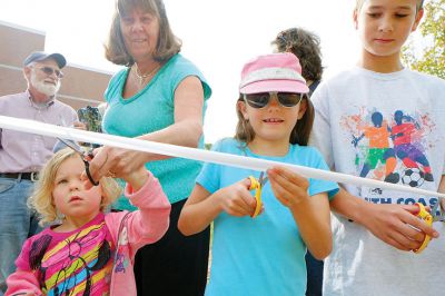 Rochester Memorial School Playground
Scores of Rochester Memorial School students, staff, and parents – as well as ORR School District Superintendent Doug White – gathered to celebrate the official opening of their new playground on Monday, constructed last month by volunteers. “It took a village to get this done,” said faculty member Craig Davignon during the festivities. “It’s proud day for our entire community.” New principal Derek Medeiros spoke, as well. Photo by Shawn Badgley 
