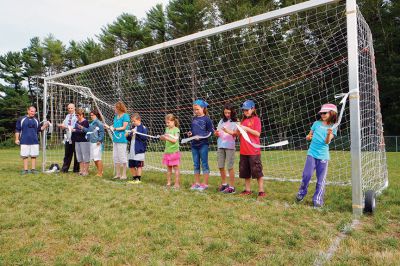 Rochester Memorial School Playground
Scores of Rochester Memorial School students, staff, and parents – as well as ORR School District Superintendent Doug White – gathered to celebrate the official opening of their new playground on Monday, constructed last month by volunteers. “It took a village to get this done,” said faculty member Craig Davignon during the festivities. “It’s proud day for our entire community.” New principal Derek Medeiros spoke, as well. Photo by Shawn Badgley 
