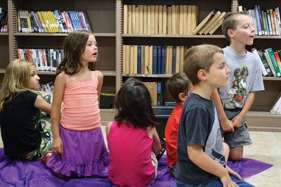 Science Roadshow
The Children’s Museum in Easton brought its Science Roadshow to the Plumb Library on August 6, and showed kids how to make a rocket out of a film canister (remember those?) and an Alka-Seltzer, and create sizzling artwork with vinegar, food coloring, and baking soda. Photos by Jean Perry
