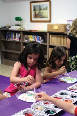 Science Roadshow
The Children’s Museum in Easton brought its Science Roadshow to the Plumb Library on August 6, and showed kids how to make a rocket out of a film canister (remember those?) and an Alka-Seltzer, and create sizzling artwork with vinegar, food coloring, and baking soda. Photos by Jean Perry
