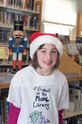 Plumb Library Open House
The Friends of the Plumb Library opened the library doors to the public on Saturday, December 5 during its annual Holiday Open House. The event is known for its unique raffle prizes and live ancient Christmas carols performed by Friends, staff, and Junior Friends, and Santa made a visit as he always does. Photos by Colin Veitch
