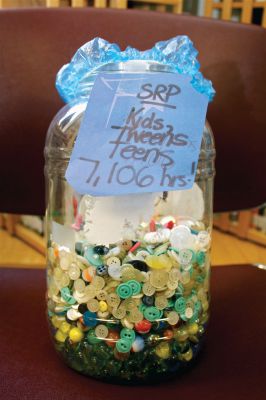 Summer Reading Program
For each hour participants read, they placed a button in this jar.  At the end of the "Dream Big: Read" summer reading program, students and their families had spent 7,106 hours reading.  Photo by Eric Tripoli.
