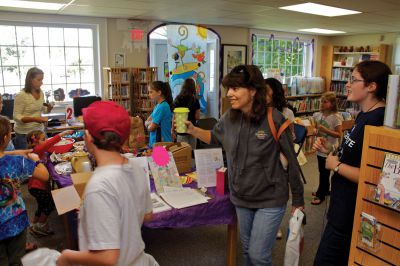 Summer Reading Program
Several families turned out to the "Dream Big: Read" celebration on Saturday, September 15, 2012, at Plumb Library in Rochester.  Past summer reading programs focused only on the students but "Dream Big: Read" encouraged families, students, and teachers alike to get involved in developing good reading habits.  Photo by Eric Tripoli.
