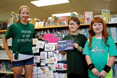 Summer Reading Program
(from left) Catherine Wheeler, Amanda Wheeler, and Emily Wheeler were some of the top readers of the summer.  At the celebration at Plumb Library on Saturday, September 15, the Wheeler family received recognition for being some of the Best Loggers and Best Library Activities Participants in the program.  Photo by Eric Tripoli.
