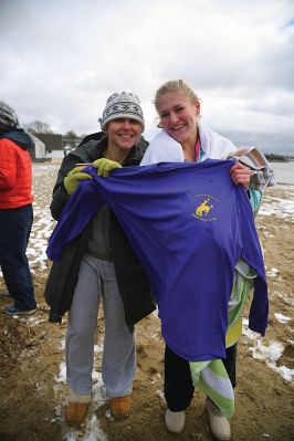 Christmas Day Swim
The Helping Hands and Hooves’ annual Christmas Day Swim was preceded by a polar plunge in the weather and a brief ‘snownado’ of sorts as the winds swept snow and sleet across the area only minutes before enthusiastic participants in costume arrived at the Mattapoisett Town Beach and raced into the icy waters. Photos by Glenn C. Silva
