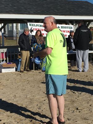 Christmas Plunge
Helping Hands and Hooves of Mattapoisett continued the tradition of plunging into the chilly waters of the Town Beach on Christmas morning as a way to fundraise for the non-profit organization’s free equestrian therapy programs serving local differently-abled adults. Photos by Marilou Newell
