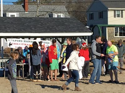 Christmas Plunge
Helping Hands and Hooves of Mattapoisett continued the tradition of plunging into the chilly waters of the Town Beach on Christmas morning as a way to fundraise for the non-profit organization’s free equestrian therapy programs serving local differently-abled adults. Photos by Marilou Newell
