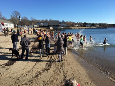 Christmas Plunge
Helping Hands and Hooves of Mattapoisett continued the tradition of plunging into the chilly waters of the Town Beach on Christmas morning as a way to fundraise for the non-profit organization’s free equestrian therapy programs serving local differently-abled adults. Photos by Marilou Newell
