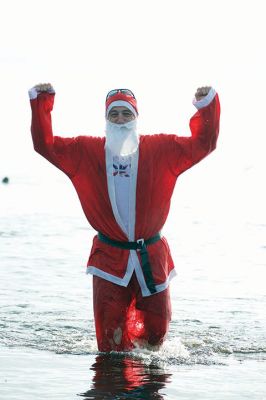 14th Annual Christmas Day Swim
The Helping Hands and Hooves 14th Annual Christmas Day Swim got a helping hand from the unseasonably warm weather, drawing in roughly 80 participants who took the polar plunge to support the organization’s therapeutic horseback riding program for adults with special needs. Photos by Colin Veitch
