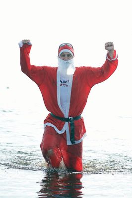 14th Annual Christmas Day Swim
The Helping Hands and Hooves 14th Annual Christmas Day Swim got a helping hand from the unseasonably warm weather, drawing in roughly 80 participants who took the polar plunge to support the organization’s therapeutic horseback riding program for adults with special needs. Photos by Colin Veitch
