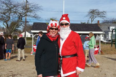 14th Annual Christmas Day Swim
The Helping Hands and Hooves 14th Annual Christmas Day Swim got a helping hand from the unseasonably warm weather, drawing in roughly 80 participants who took the polar plunge to support the organization’s therapeutic horseback riding program for adults with special needs. Photos by Colin Veitch
