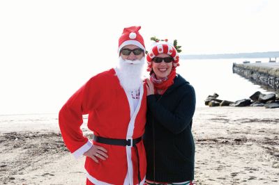 14th Annual Christmas Day Swim
The Helping Hands and Hooves 14th Annual Christmas Day Swim got a helping hand from the unseasonably warm weather, drawing in roughly 80 participants who took the polar plunge to support the organization’s therapeutic horseback riding program for adults with special needs. Photos by Colin Veitch
