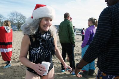 14th Annual Christmas Day Swim
The Helping Hands and Hooves 14th Annual Christmas Day Swim got a helping hand from the unseasonably warm weather, drawing in roughly 80 participants who took the polar plunge to support the organization’s therapeutic horseback riding program for adults with special needs. Photos by Colin Veitch
