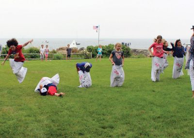 Point Connett Summer
Every year around the 4th of July, the children of Point Connett parade through the neighborhood decorated for the 4th.A small event follows for the kids with activities (a potato sack race, egg-in-spoon race, 3-legged race, hoolahoop contest). Photos courtesy Lauren Hawkins
