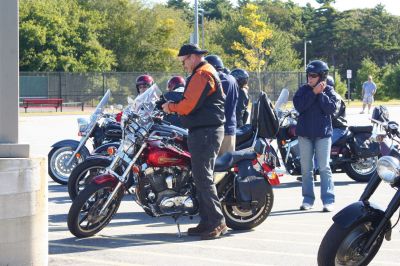Poker Run
Motorcyclists gathered Sunday morning, September 20, in the parking lot of ORR to ride in the third annual Poker Run for Alex Pateakos. Alex is a five-year-old Marion boy who suffers from Spinal Muscular Atrophy. Money raised by the poker run will benefit Alex, and Families of SMA, a group that helps families like the Pateakos live their lives as close to normal as possible. The Poker Run covered 65 miles and ran through Lakeville, Carver, East Wareham, and back to ORR. Photo by Anne O'Brien-Kakley

