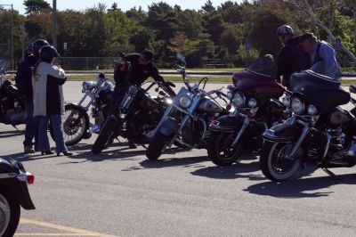 Poker Run
Motorcyclists gathered Sunday morning, September 20, in the parking lot of ORR to ride in the third annual Poker Run for Alex Pateakos. Alex is a five-year-old Marion boy who suffers from Spinal Muscular Atrophy. Money raised by the poker run will benefit Alex, and Families of SMA, a group that helps families like the Pateakos live their lives as close to normal as possible. The Poker Run covered 65 miles and ran through Lakeville, Carver, East Wareham, and back to ORR. Photo by Anne O'Brien-Kakley
